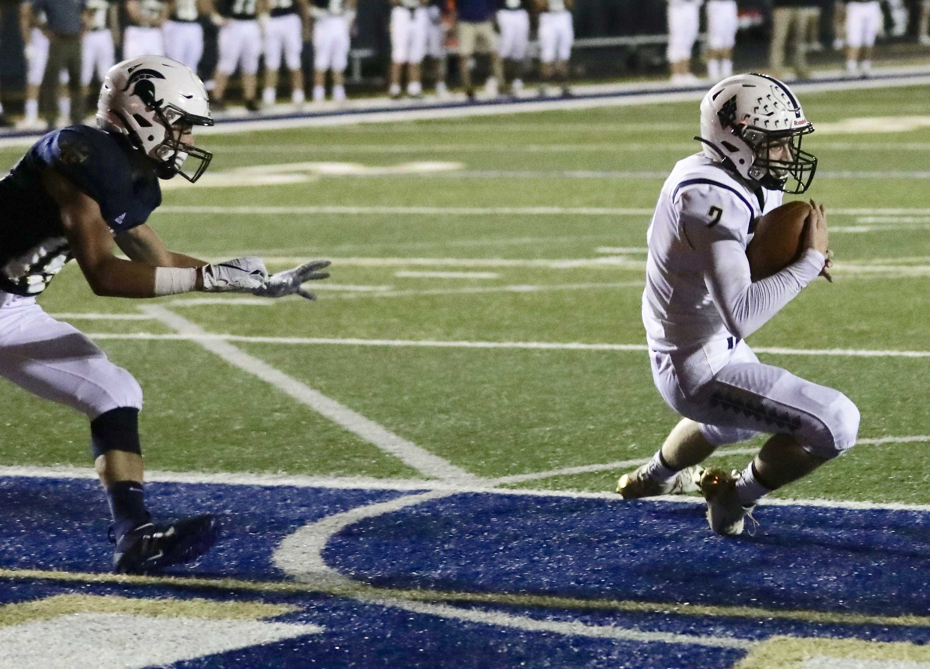 Banks' Jarred Evans catches a slant pass from quarterback Tanner Shook for the first score in a 19-14 win. (Norm Maves Jr.)