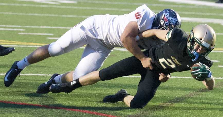 Jesuit's Kade Wisher ran for 181 yards and three touchdowns Friday. (Photo by Norm Maves Jr.)