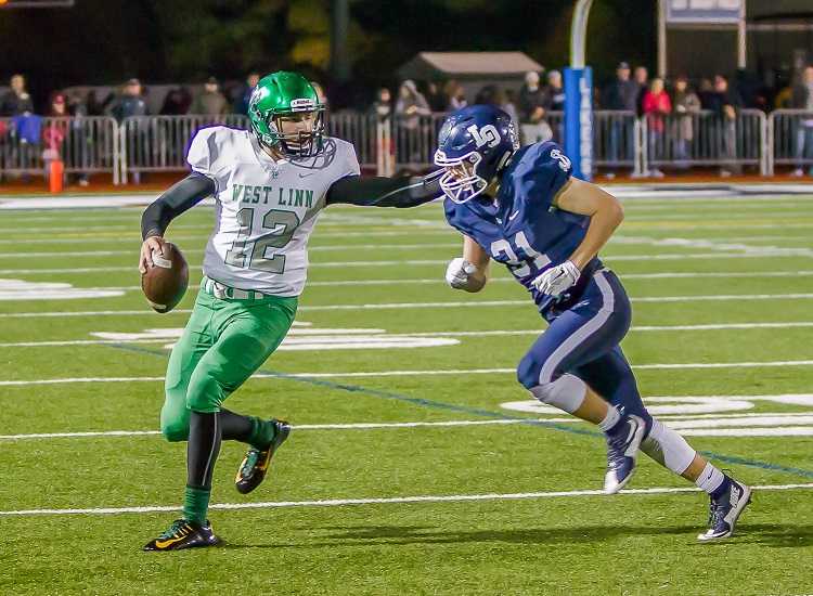 West Linn's Ethan Long left Friday's game at Sheldon with an ankle injury. (Photo by Brad Cantor)