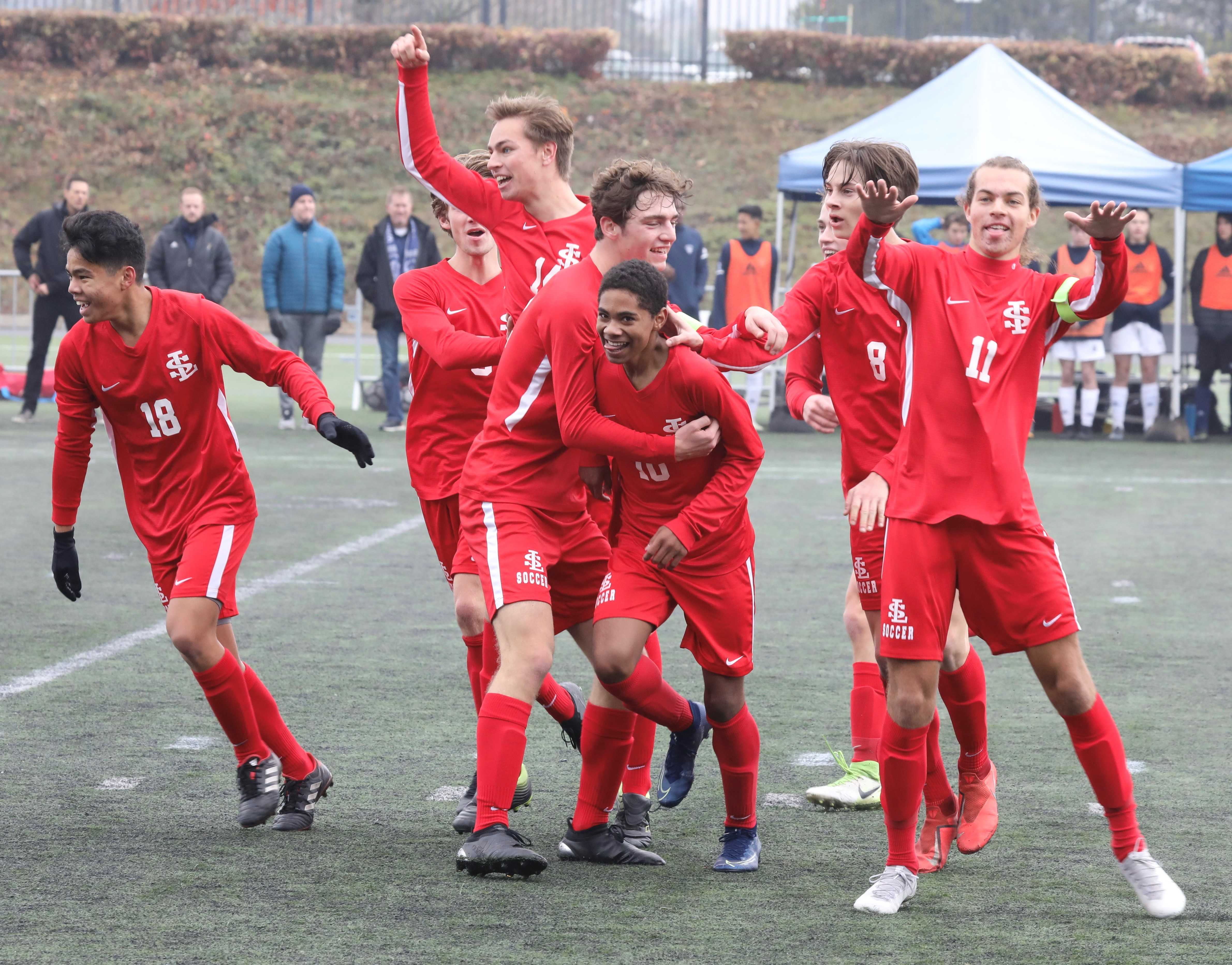 La Salle Prep's Mizael Harris (10) celebrates the first of his two goals Saturday. (Photo by Norm Maves Jr.)