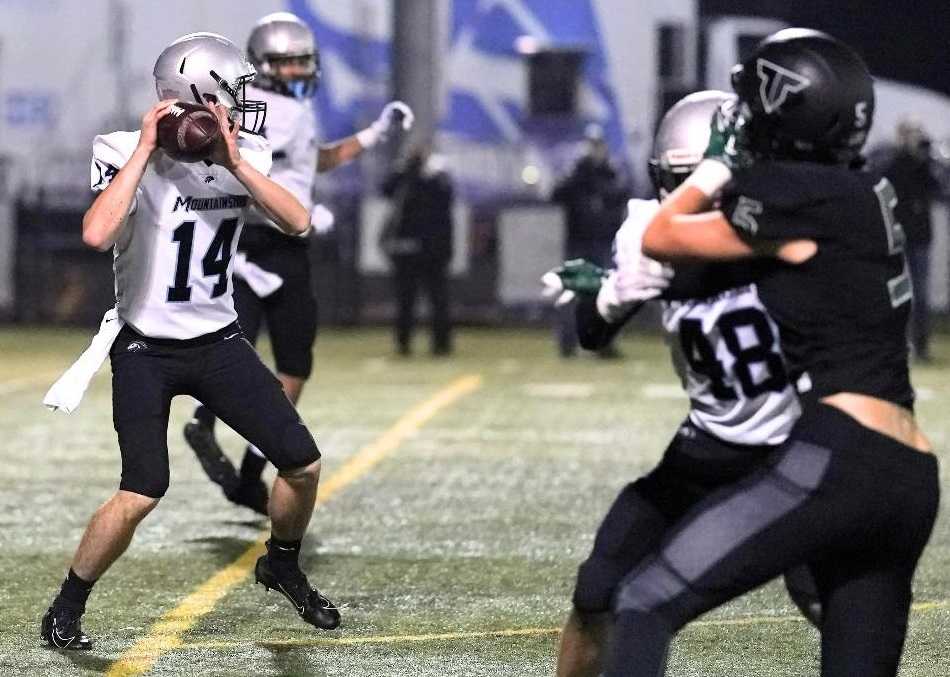 Mountainside quarterback Brian Mannion threw four touchdown passes Friday, all in the second half. (Photo by Jon Olson)