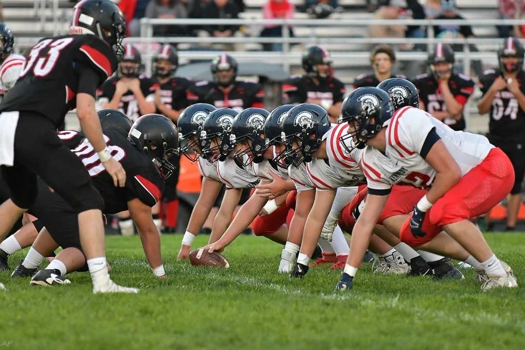 Reigning 2A champion Kennedy (right) is among the teams that might have to consider a move to 3A in 2020. (Photo by Andre Panse)