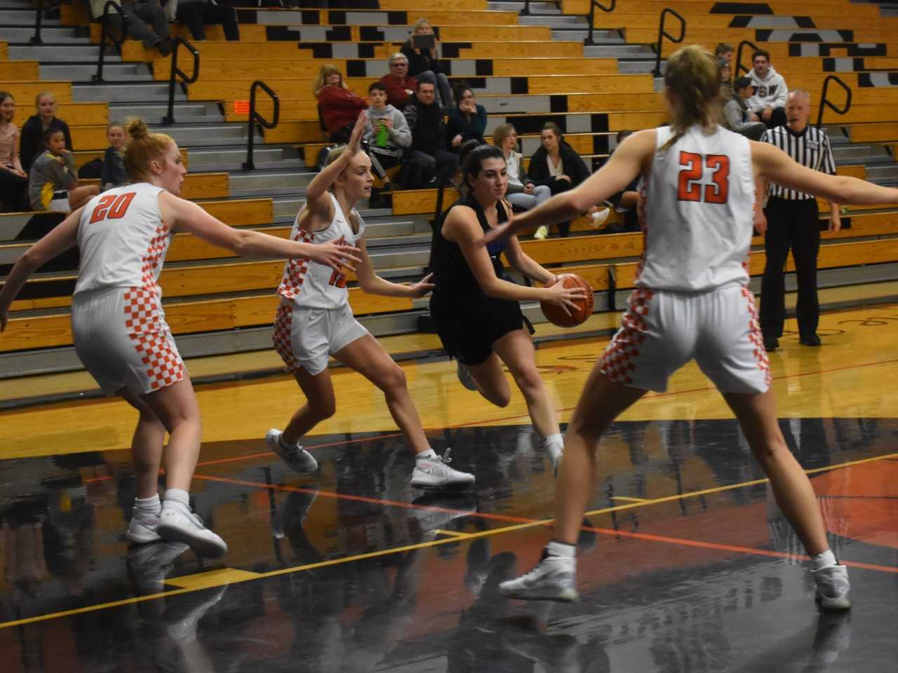 Silverton posts Riley Traeger (20) and Truitt Reilly (23) shut down Churchill drives Wednesday. (Photo by Jeremy McDonald)