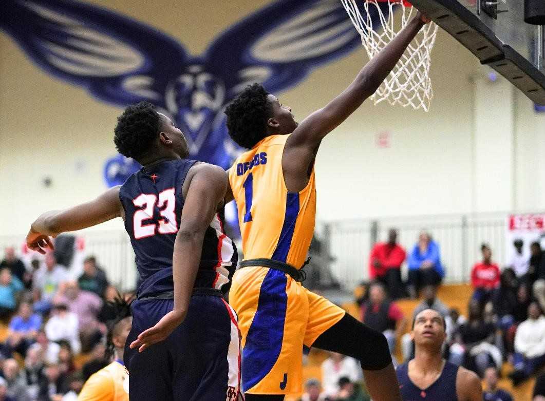 Jefferson freshman Marquis Cook goes up for two of his team-high 16 points. (Photo by Jon Olson)