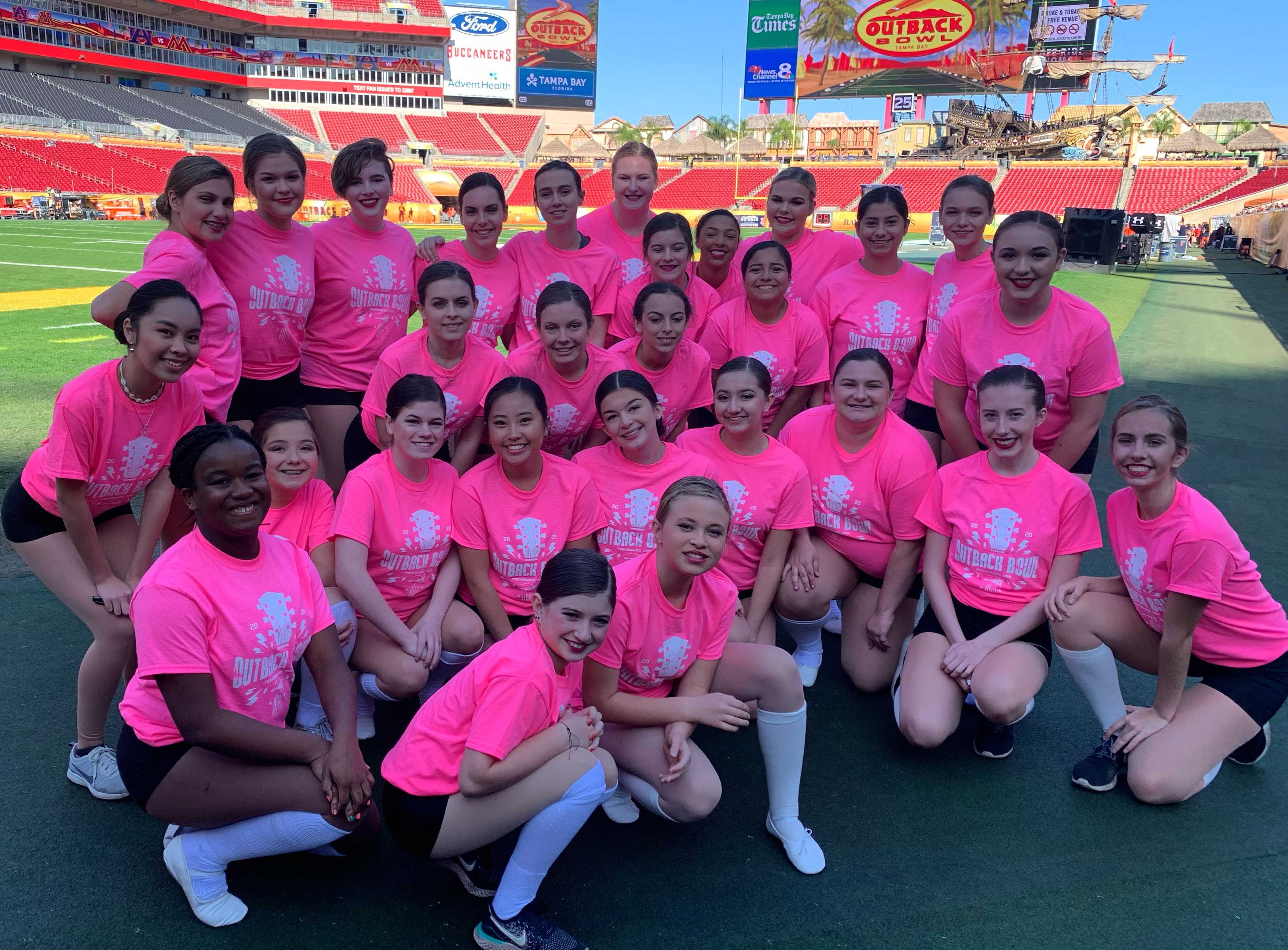 Oregon dancers get ready for their performance at the 2020 Outback Bowl.