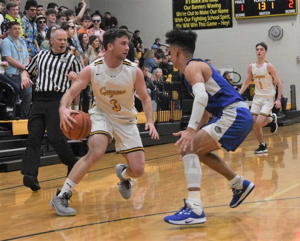 Cascade's Elijan Nolan works against Woodburn's defense Friday. (Photo by Jeremy McDonald)