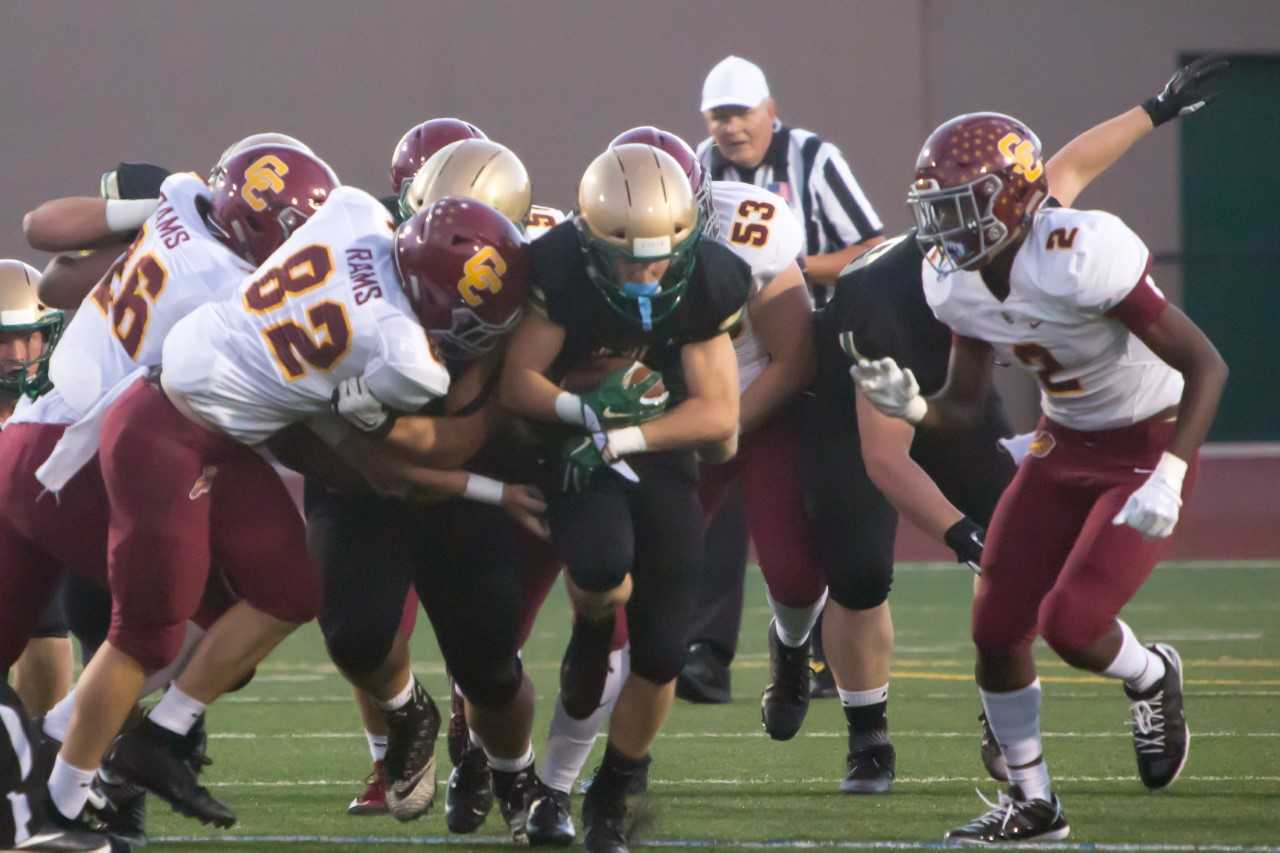 Jesuit's Kade Wisher rushed for 127 yards and two touchdowns Friday. (Photo by John Miller)