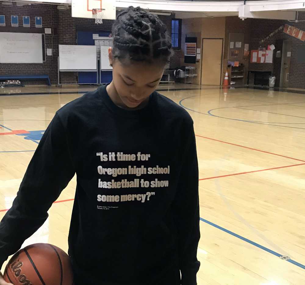 Sophomore Onna Brown wears the shooting shirt that reminds Benson of how far it has come as a program