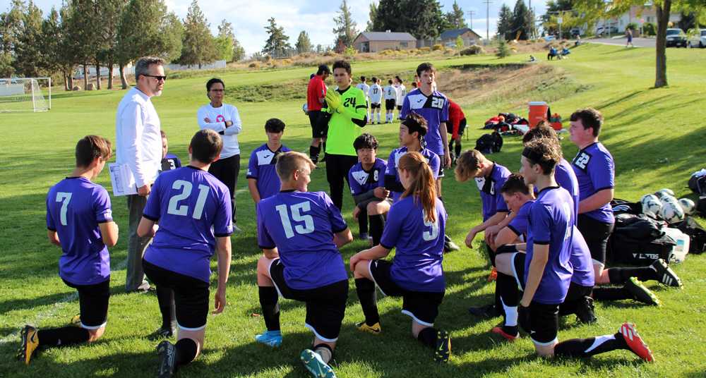 Drs. Mark and Thuy Hughes talk to their Tigers pre-COVID. They hope to keep the players safe and have a season this winter.