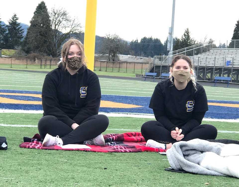 Hey all you Lion fans, stand up and clap your hands for senior cheerleaders Bailey Cordin (left) and Kassy Cave. They showed up