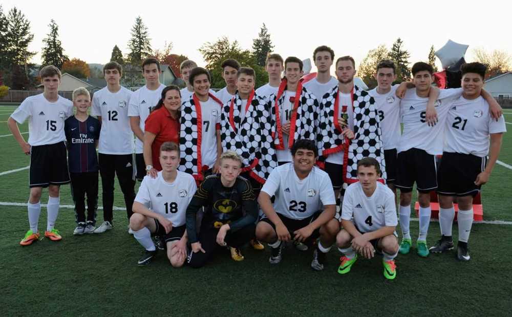 Brandi Wittenborn, with the boys soccer team at Creswell