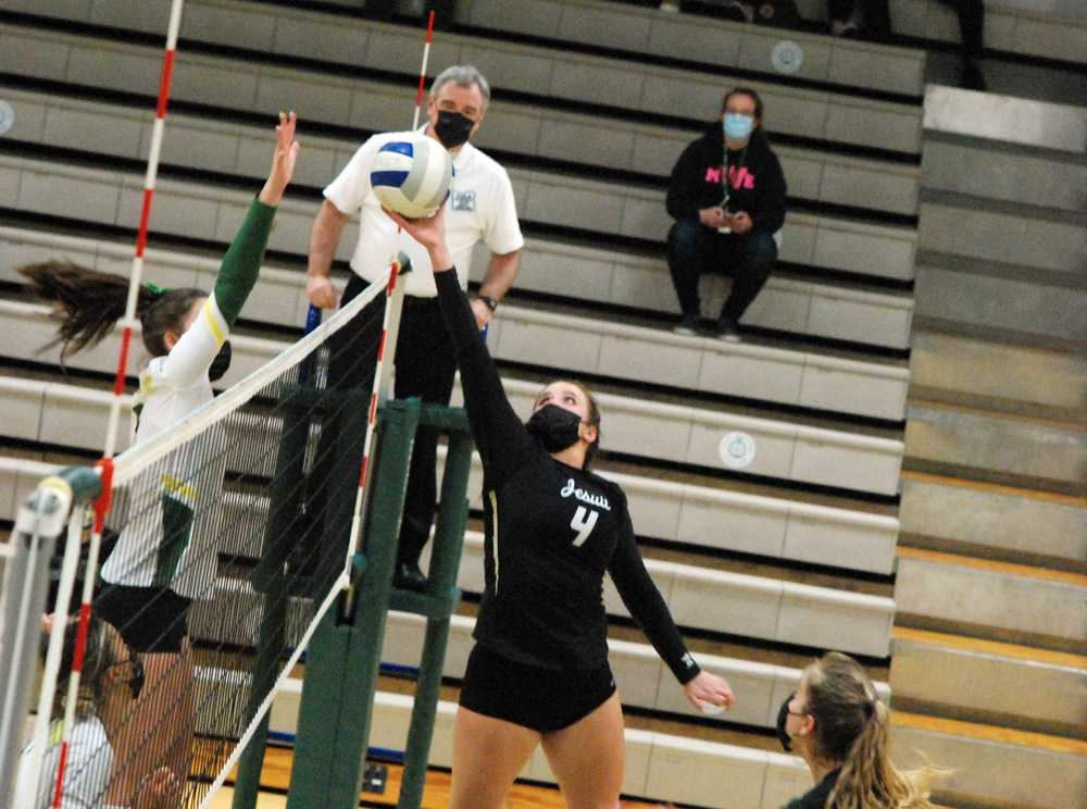 This set from Alison Buchholz in the third set helped break open a tie game on the way to Jesuit's sweep