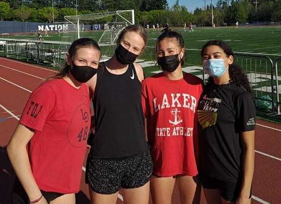 Lake Oswego's 4x100 relay: (from left) Mia Brahe-Pedersen, Chloe Collier, Riley Ha and Josie Donelson.