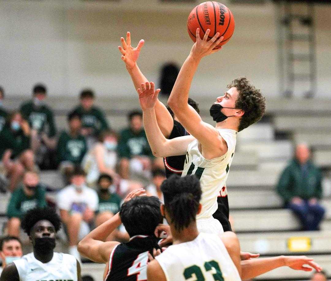 Jesuit senior James Lang takes aim in a win over Beaverton on May 27. (Photo by Jon Olson)