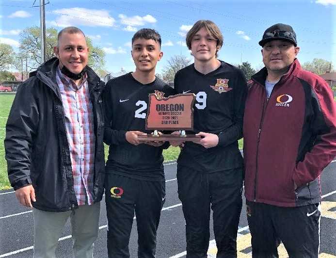 Ontario boys coach Jaime Gonzalez (left) with his son Jaime (2), nephew Jamis (9) and brother Javier, the school's girls coach.