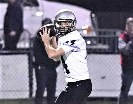 Mountainside's Brian Mannion had three touchdown passes in Friday's 27-26 overtime win over Sunset. (Photo by Jon Olson)