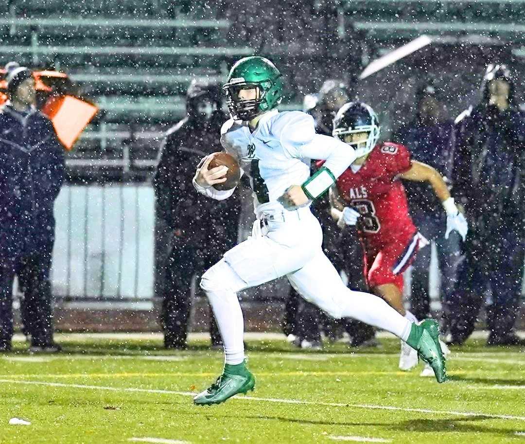 In his first start at quarterback, West Linn senior Earl Ingle helped lead his team past No. 1 Lake Oswego. (Photo by Jon Olson)