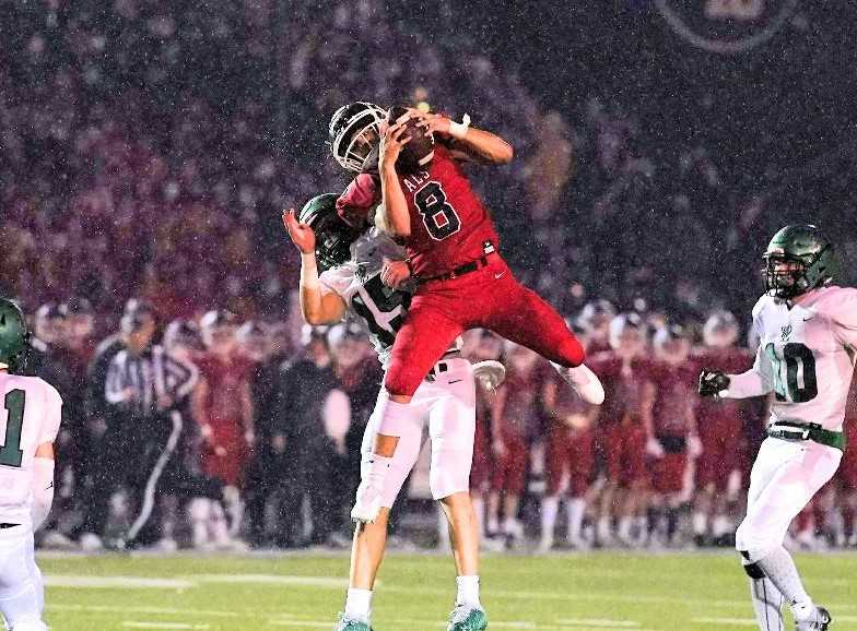 Lake Oswego senior Gabe Olvera is a threat as a runner and receiver. (Photo by Jon Olson)