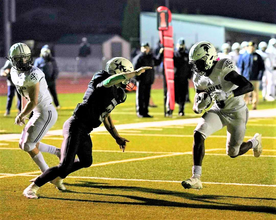 Marist Catholic senior Lucas Tuski has rushed for 467 yards in the last two playoff games. (Photo by Jon Olson)