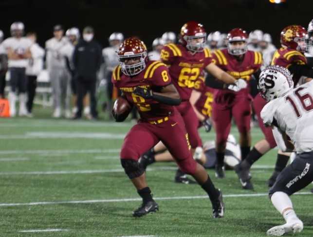 Ellis Bynum ran for 102 yards and three touchdowns in Central Catholic's quarterfinal win over Sherwood. (Photo by Jim Nagae)