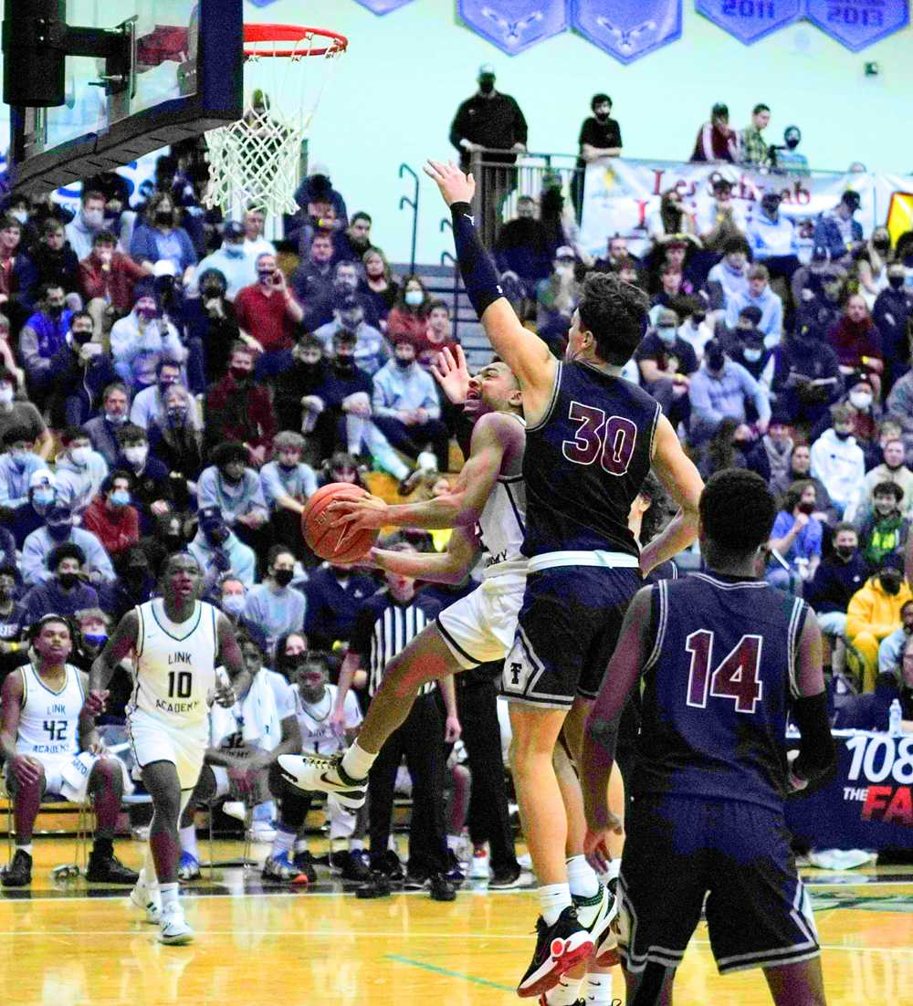 Link Academy Trey Green maneuvers around Tualatin big Kellen Hale (30) for a 4th-quarter hoop in the Lions' win. (Jon Olson)