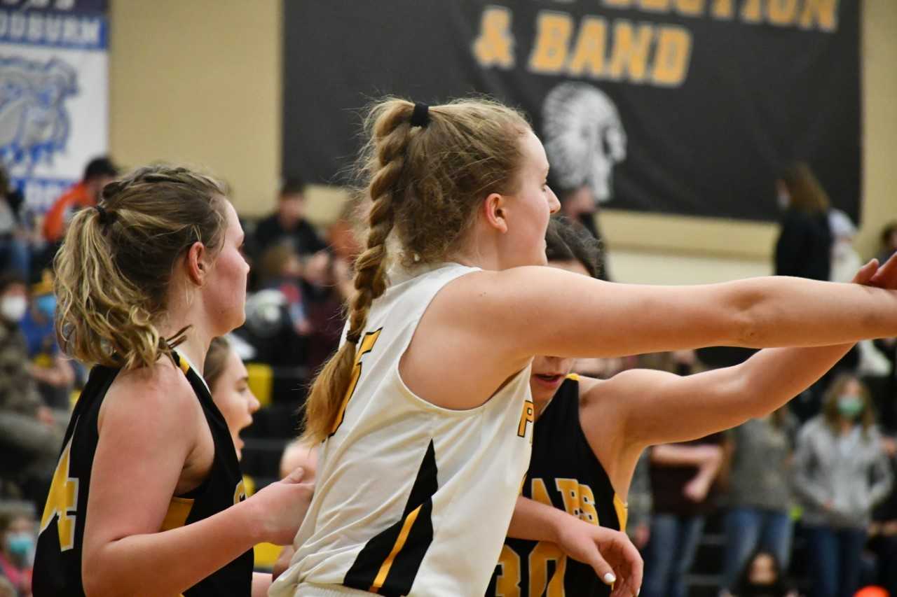 Philomath senior Sage Kramer (center) works for position inside against Cascade on Friday night. (Photo by Jeremy McDonald)