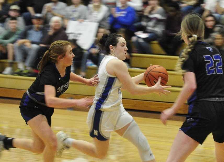 Nyssa's Malerie Long cuts through the Sutherlin defense in Friday's semifinal win. (John Gunther/The World)