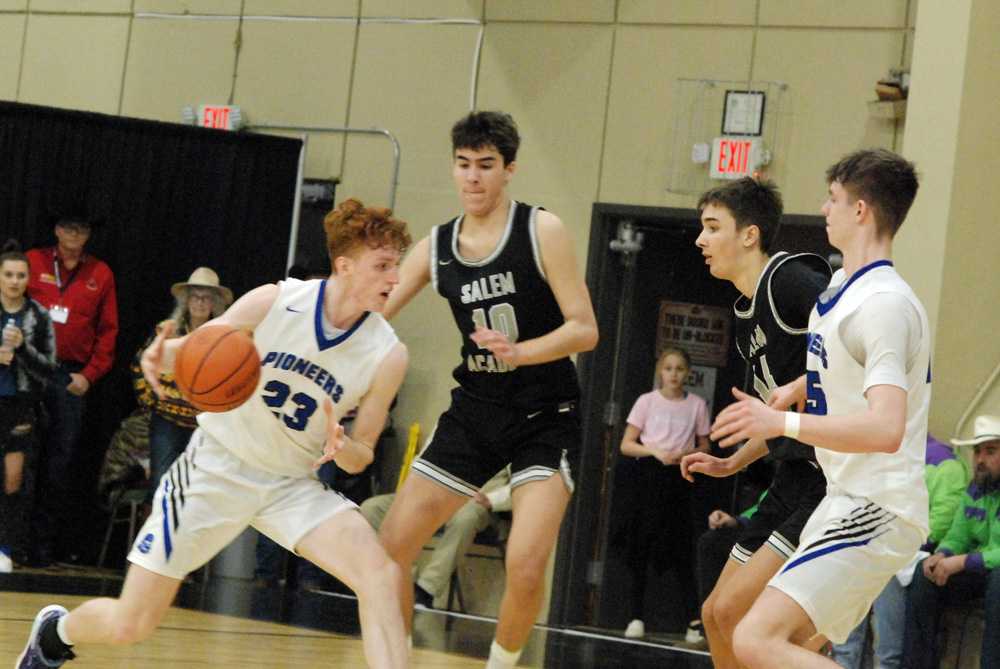 Austin Sladek (23) attacks for Western against pressure from SA's Jackson Oglesby (10). Jaren Oglesby and Chaz Storm look on