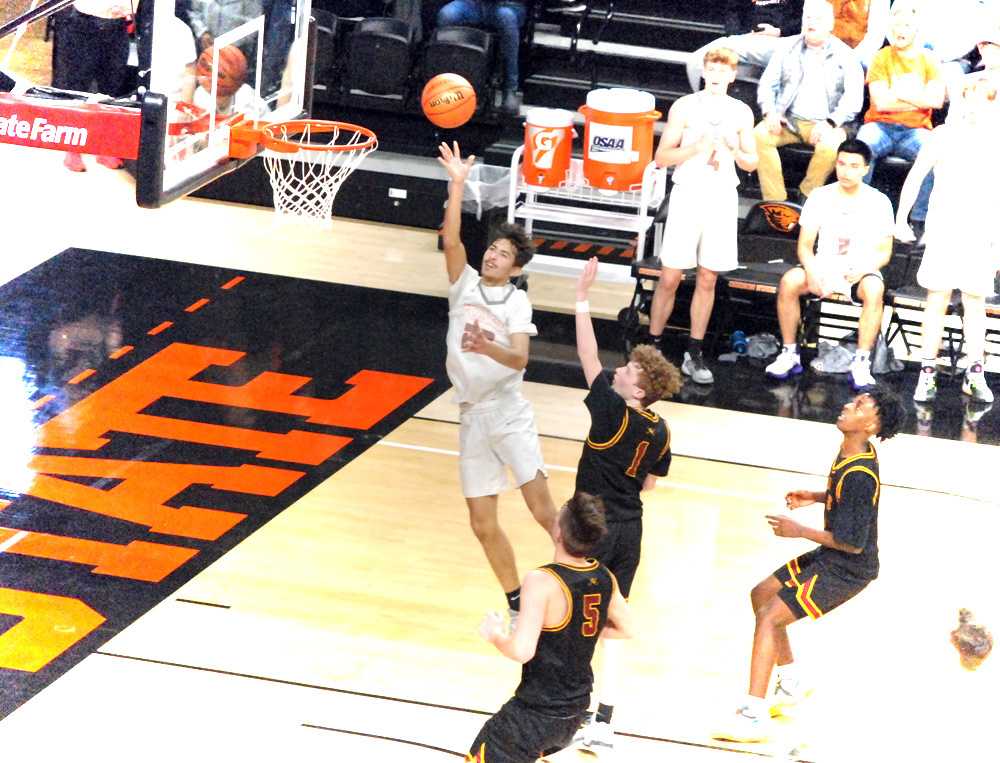 Neil Efimov hits this layup for Silverton, giving the Foxes their first lead. Silverton led twice more, including atthe end