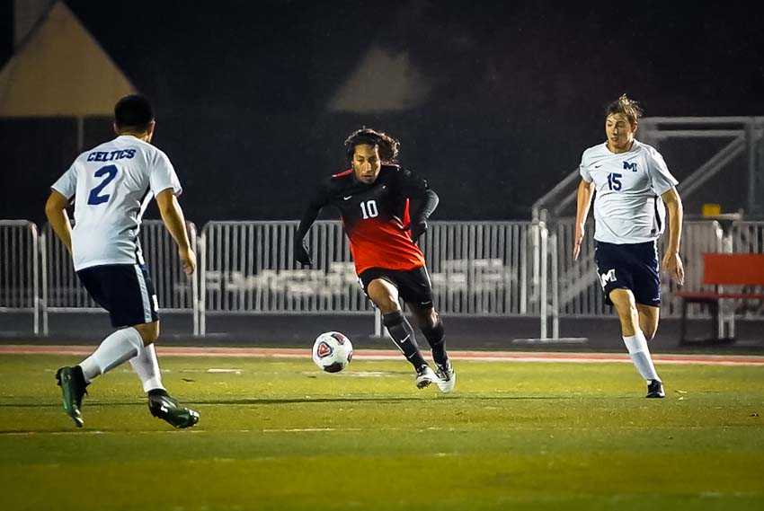 Josh Rubio presses the attack for Beaverton in its 3-1 win over McNary. (Photo by Jason Sarmiento)