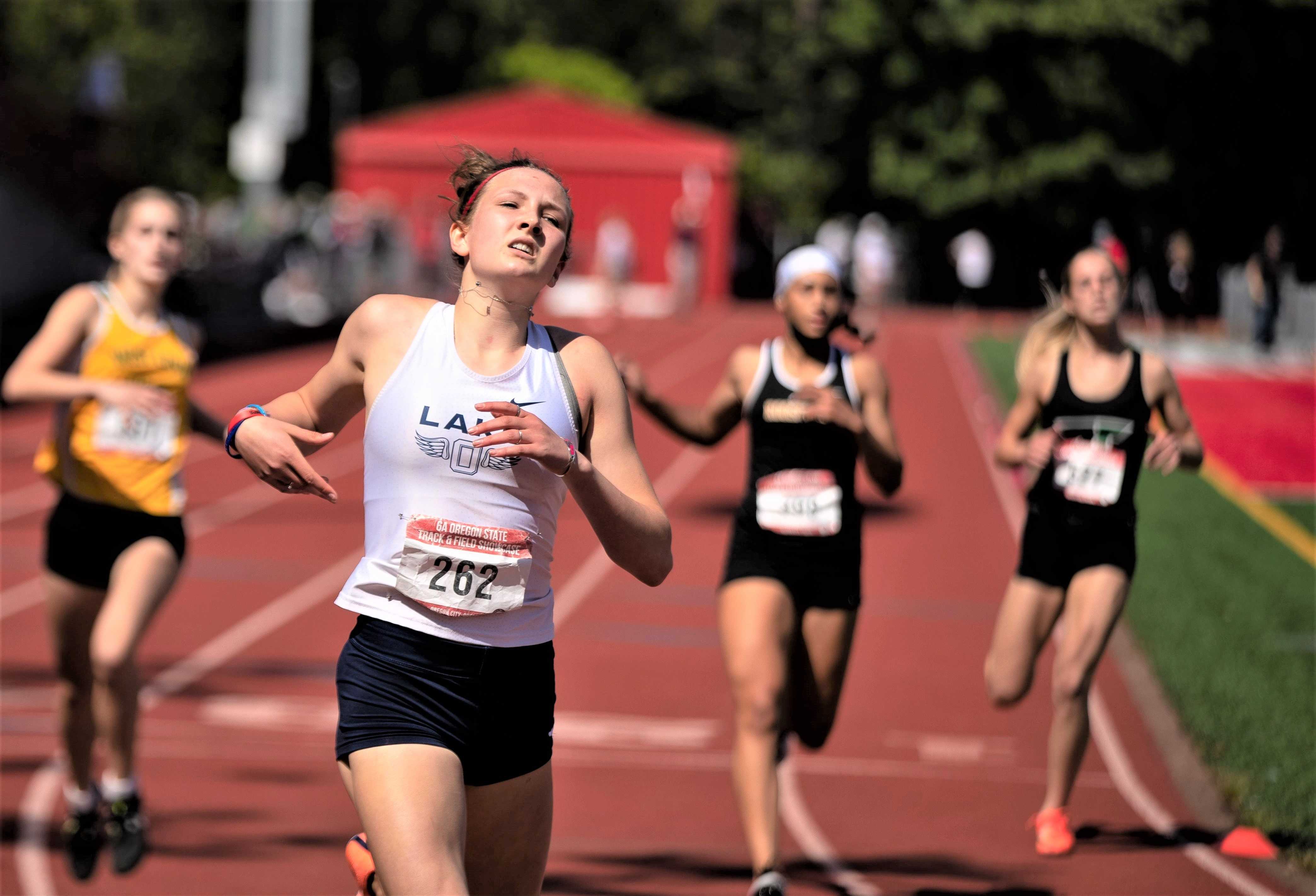 Mia Brahe-Pedersen won the 100 and 200 in the season-ending 6A meet as a freshman last year. (Photo by Jordan Beckett)