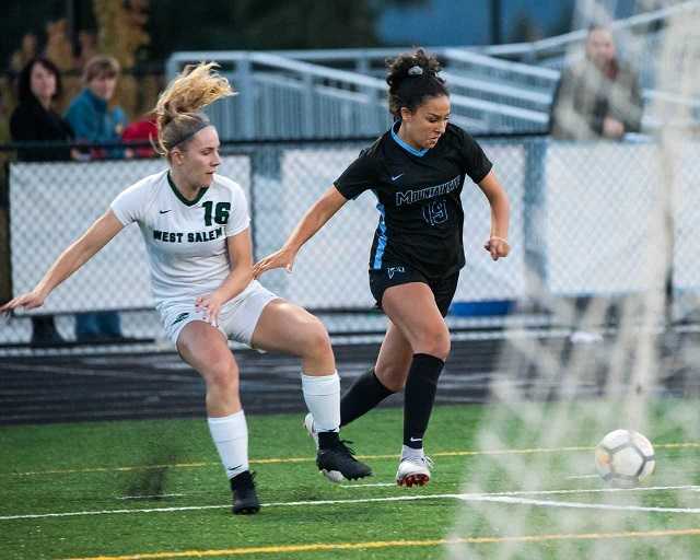 Mountainside junior Nedya Sawan (right) was named the Metro League player of the year.