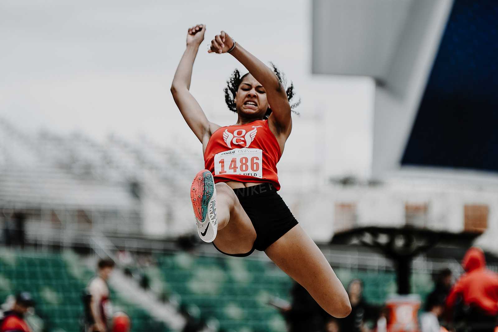 Sophia Beckmon, competing at the 6A meet in May, soared past 20 feet three times Friday. (Photo by Fanta Mithmeuangneua)