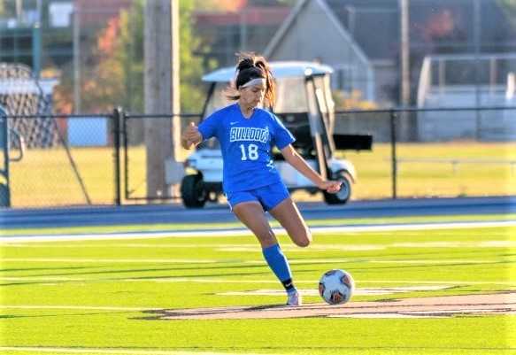 Midfielder Thalia Monroy is among seven seniors who played on Woodburn's 2019 title team. (Photo by Christian Zavala)