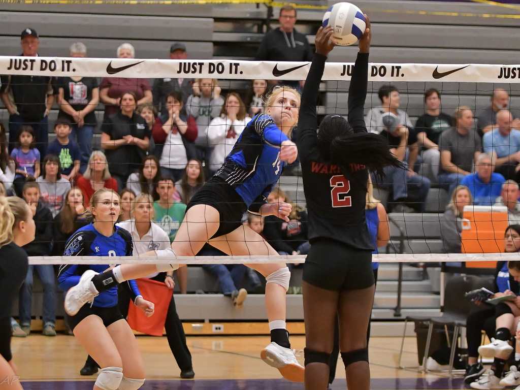 St. Paul's Isabelle Wyss, hitting against North Douglas, had 21 kills against Powder Valley. (Photo by Andre Panse)