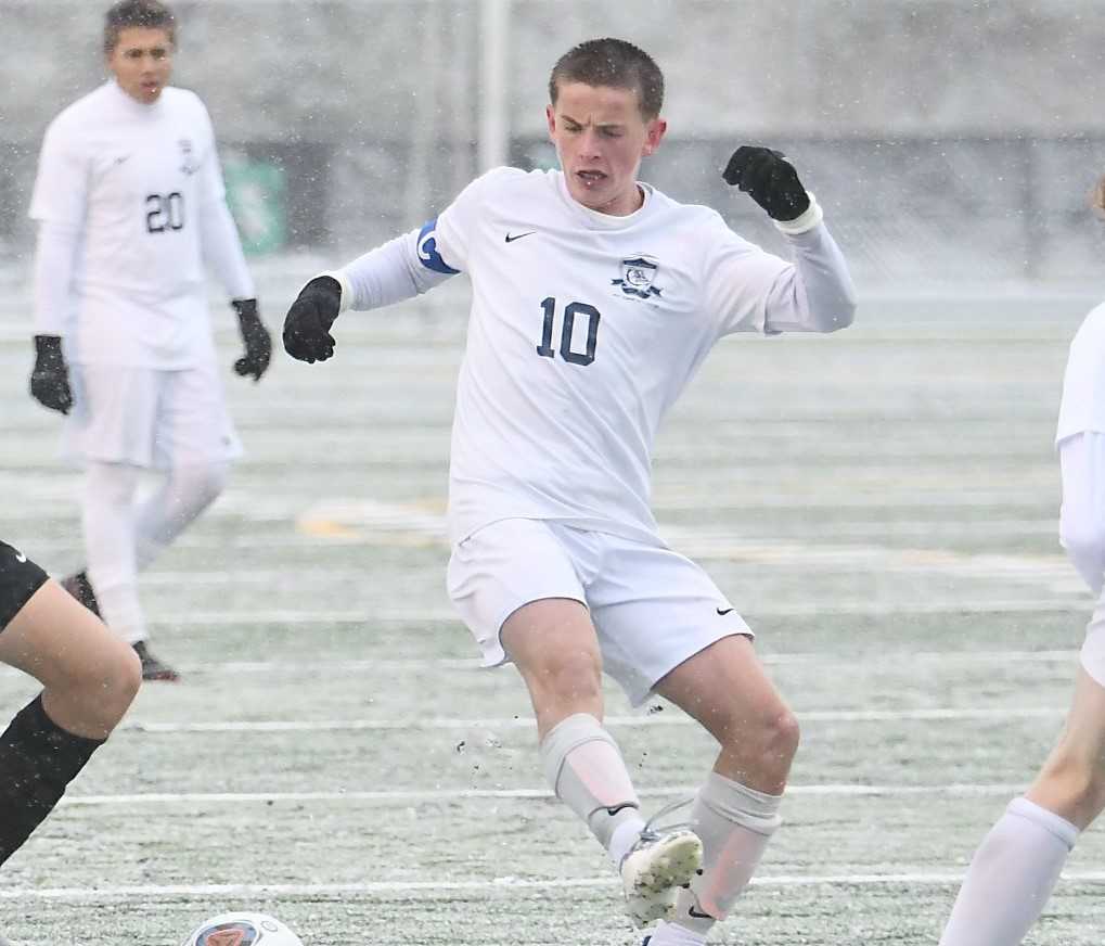 West Albany's Henry Catlin, a Mid-Willamette first-team pick, fights for the ball Tuesday at Summit. (Photo by Kris Cavin)