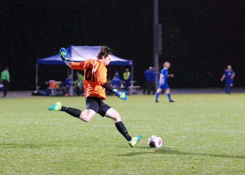 Catlin Gabel boys soccer goalie Bowen Blair booms a goal kick