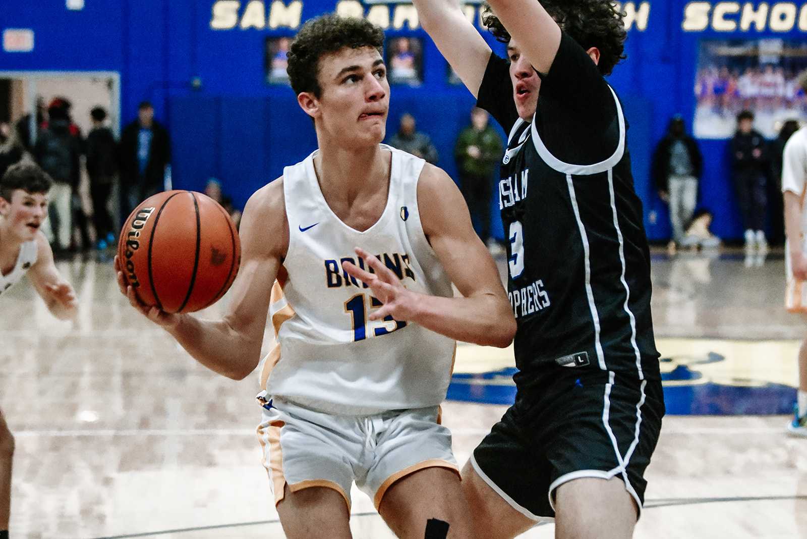 Barlow sophomore Mason Bierbrauer (13) battles inside in Friday's 91-72 home win over Gresham. (Photo by Fanta Mithmeuangneua)