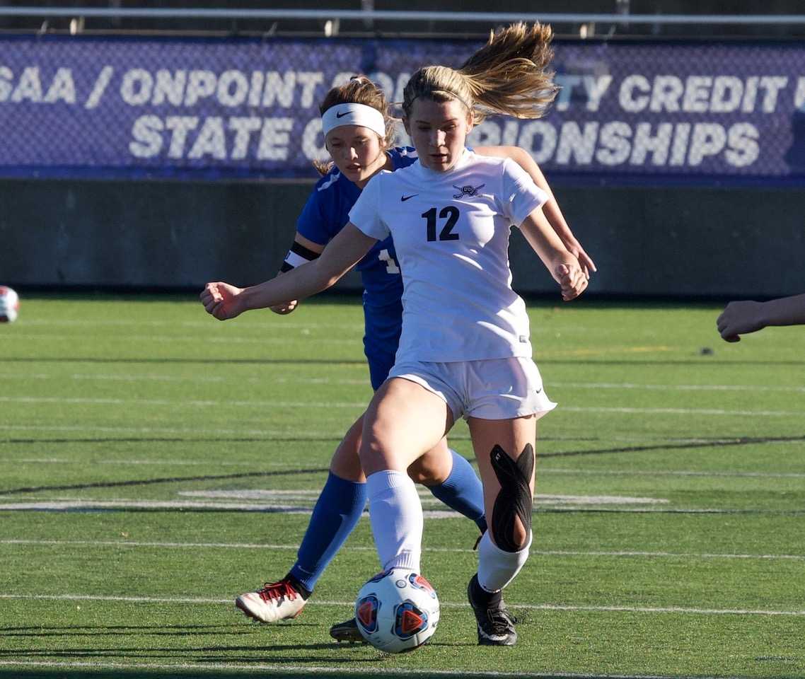 Crescent Valley's Ana McClave (12) scored two goals, including the winner in overtime. (Photo by Norm Maves Jr.)