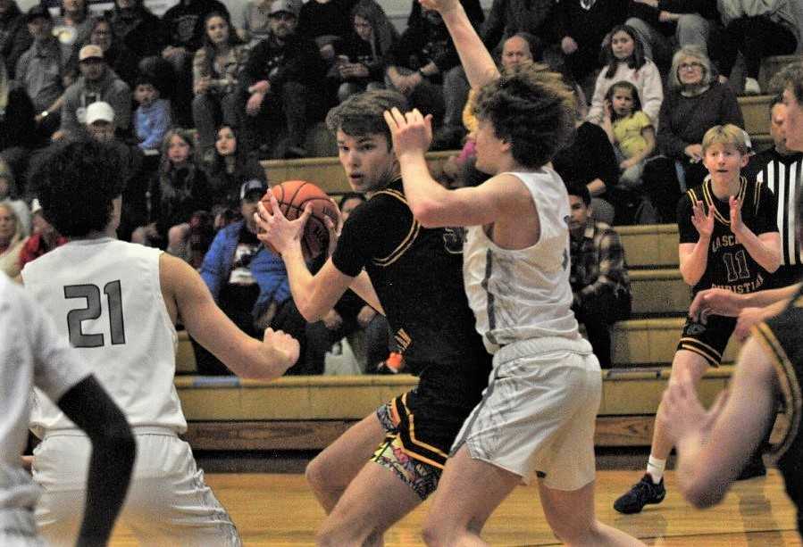 Cascade Christian's Austin Maurer works inside against Westside Christian in Saturday's 3A final. (Photo by John Gunther)