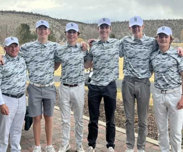 Summit coach Andy Heinly (left) with (from left) Jakob Hansen, Brody Grieb, Ryan Mitchell, Owen Harper and Nick Huffman.