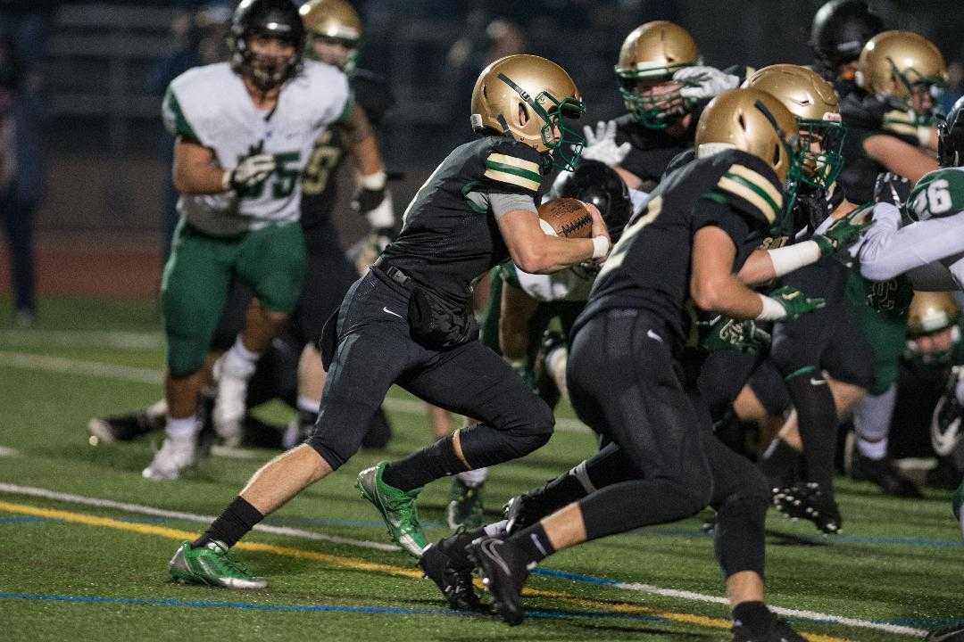 Quarterback Will Spitznagel and Jesuit overcame a 12-point deficit in the fourth quarter Friday. (Photo by Ralph Greene)