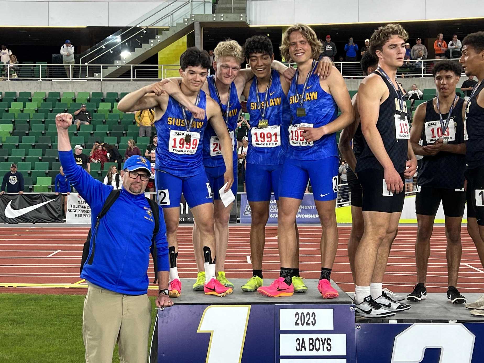 Siuslaw's Chris Johnson, Hunter Petterson, Sam Ulrich, Raymundo Brito Xilot, and Jacob Blankenship (L to R) celebrate Friday.