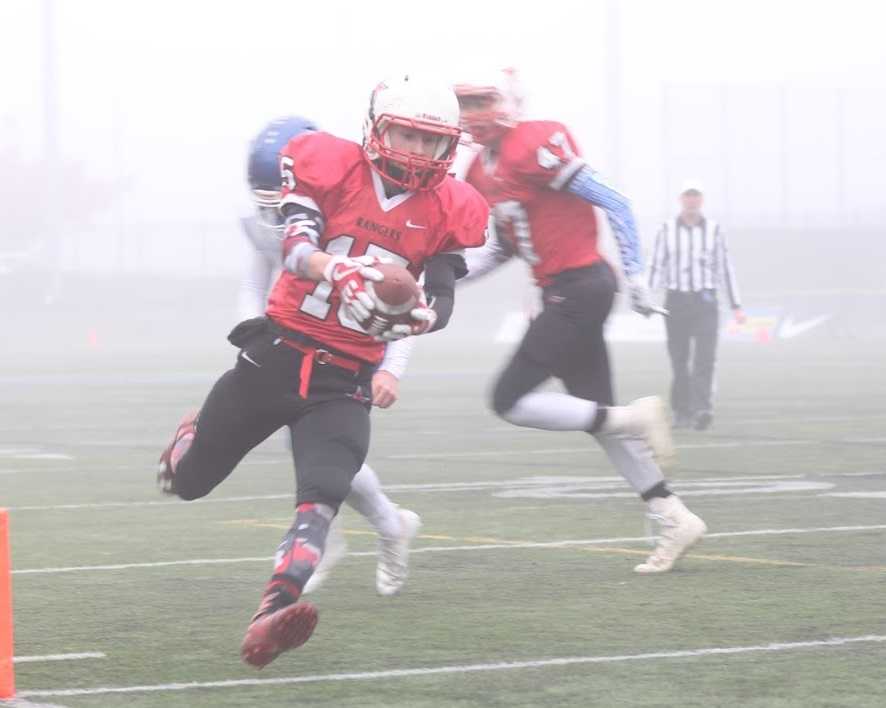 Dufur's Tanner Masterson scored on a run and an interception return against St. Paul. (Photo by Robert Wallace)