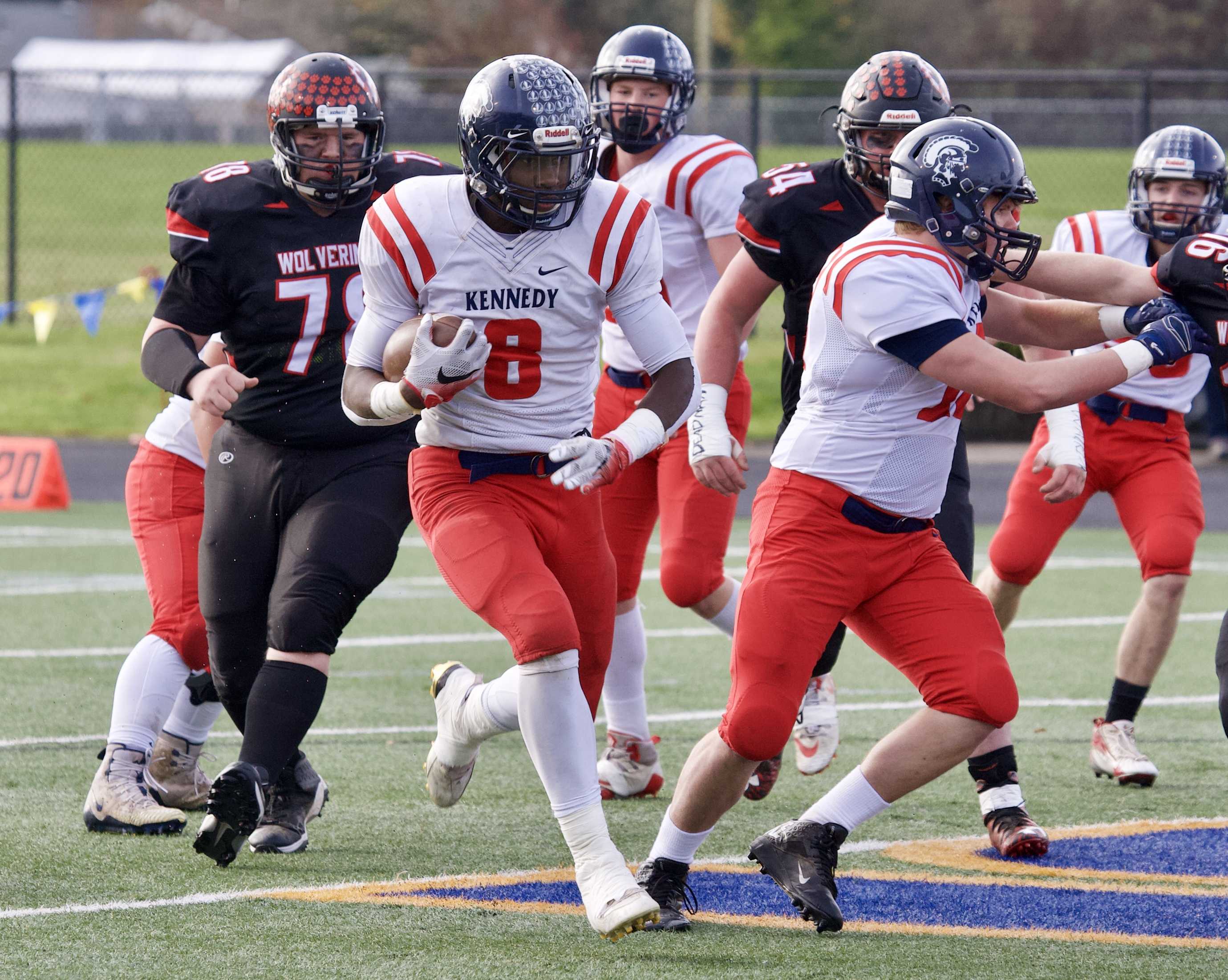 Kennedy's Emorej Lynk takes off on a 56-yard touchdown run on the first drive of the game. (Photo by Norm Maves Jr.)