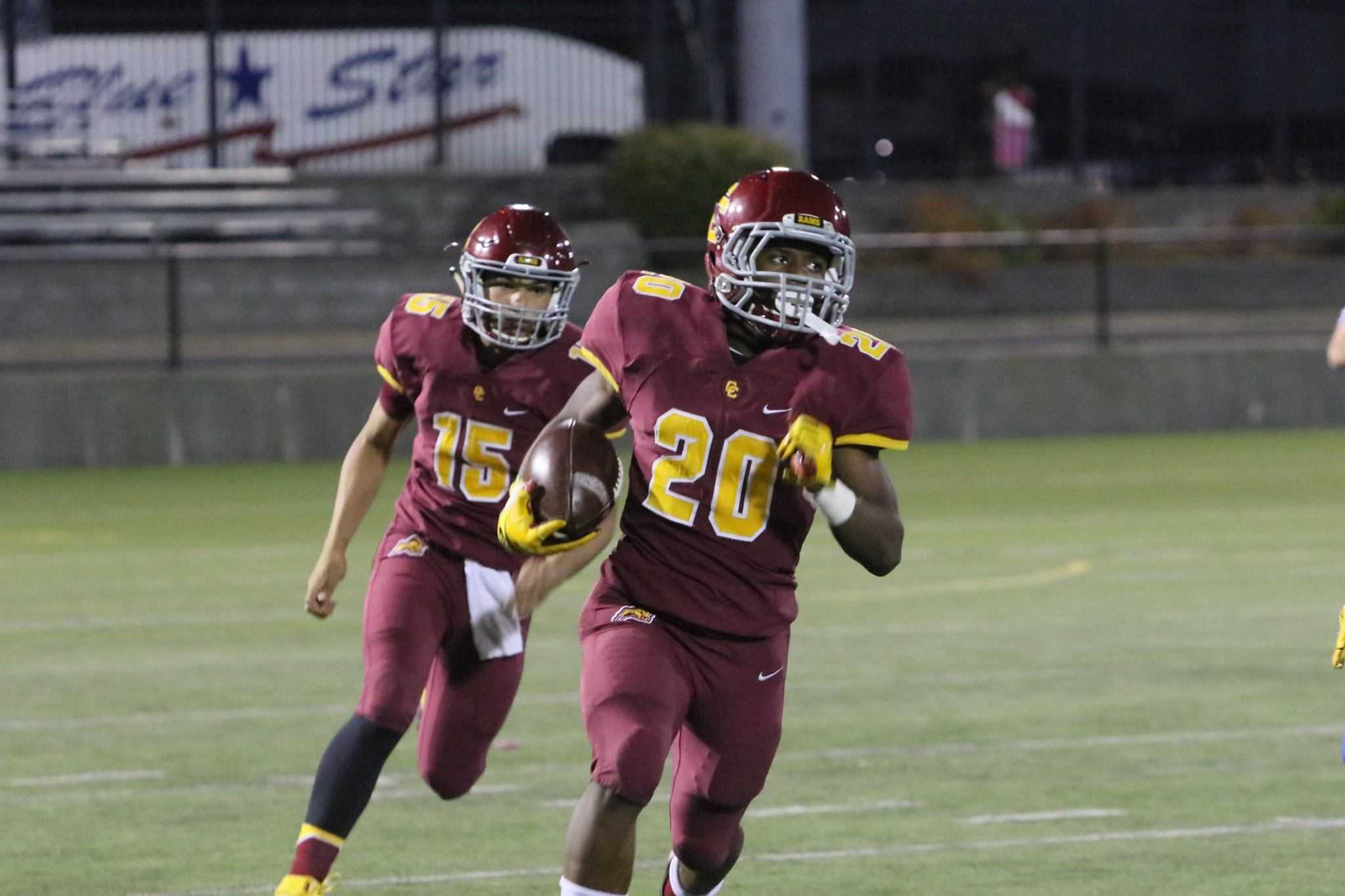 Running back Elijah Elliott (20) and quarterback Cade Knighton (15) will help lead the Rams in 2018. (Photo by Jim Nagae)