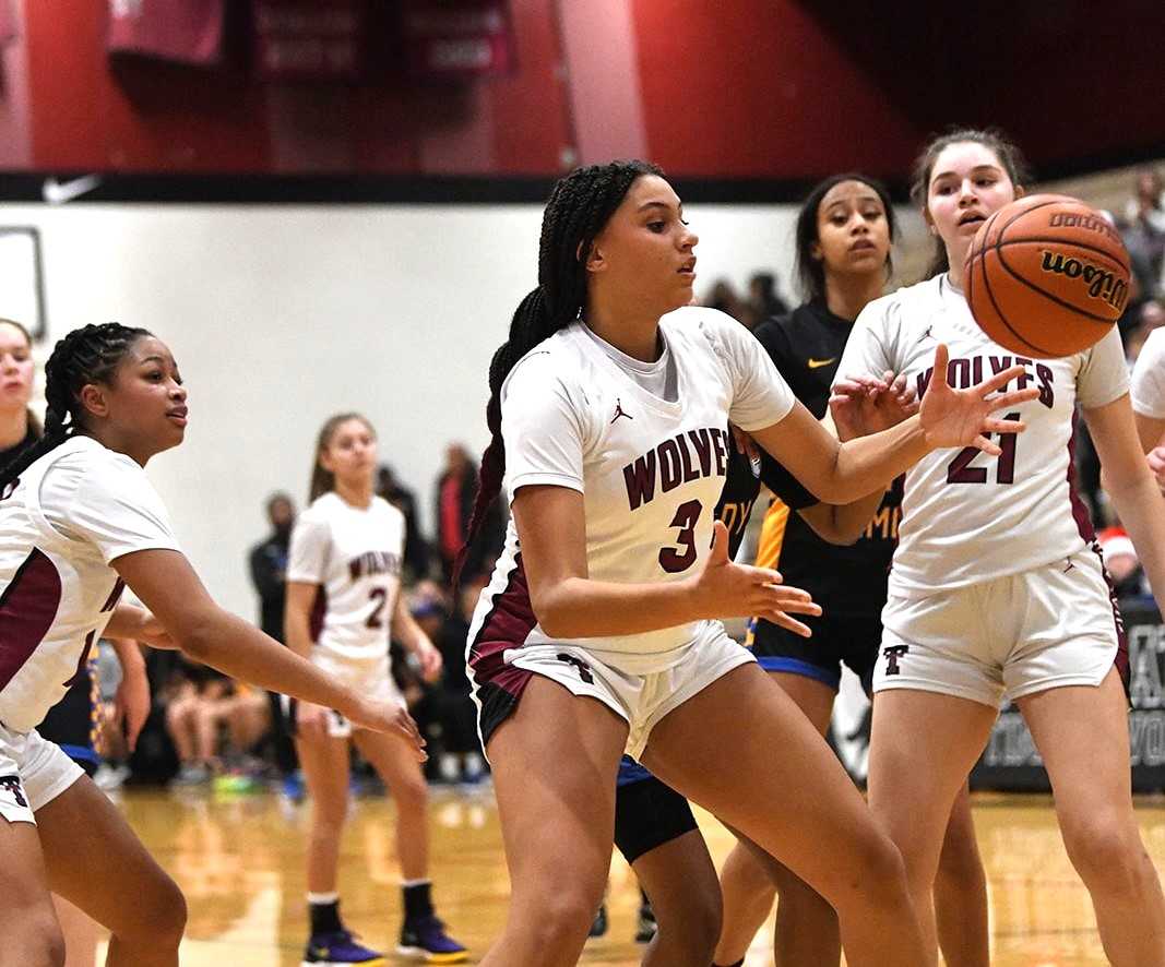 Tualatin junior post Jordyn Smith (3) is averaging 11.3 points and 9.1 rebounds this season. (Photo by Fanta Mithmeuangneua)