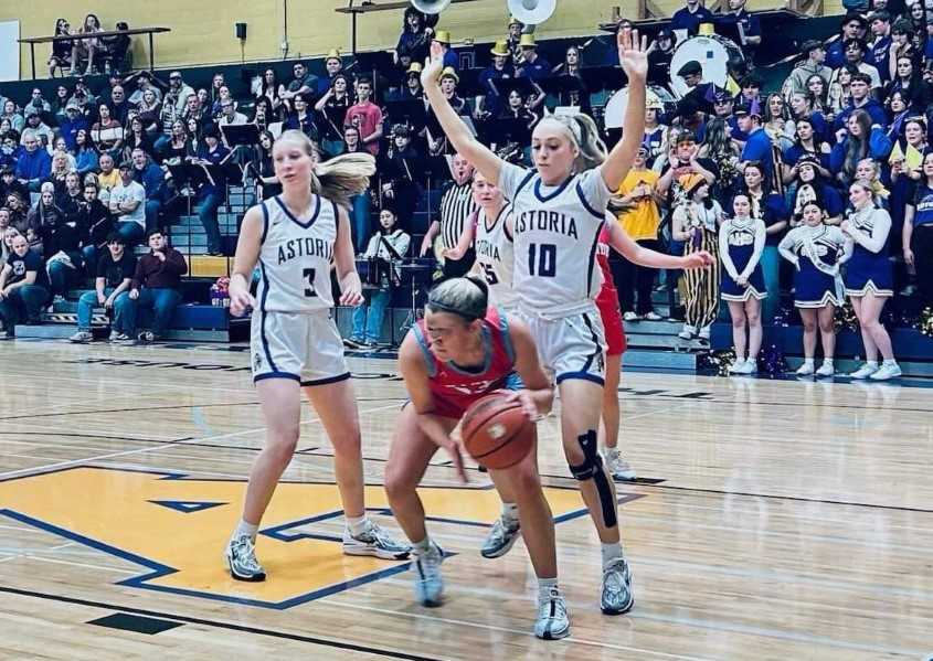 Astoria's Avery Biederman (10) and Emery Young (3) defend against Seaside in a Cowapa League game. (Photo by Brittney Clarke)