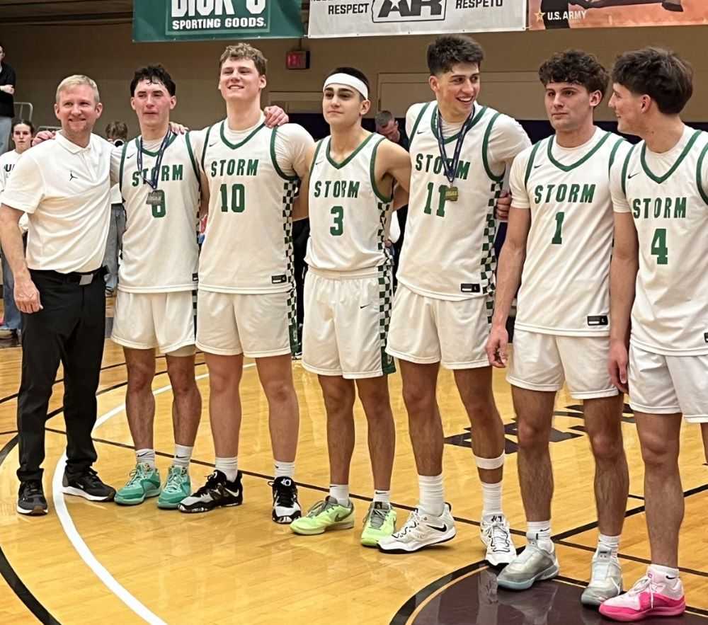 Summit coach Jon Frazier with the seniors he's been on a titile hunt with for four years, including finals hero Mac Bledsoe (1)