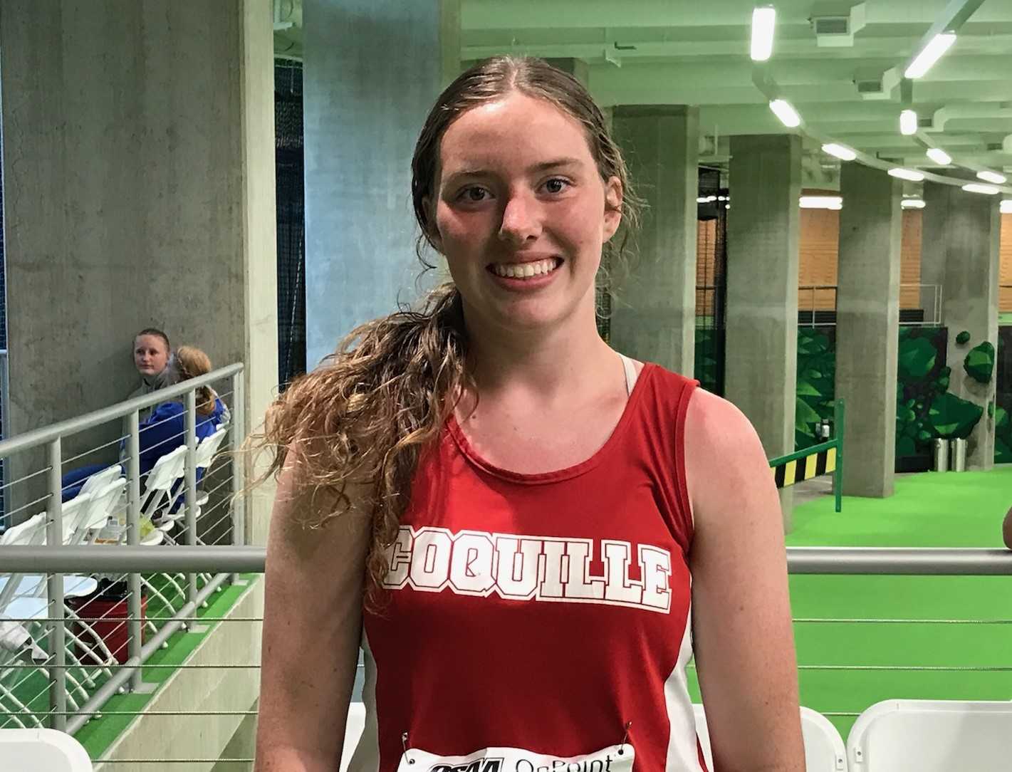 Holli Vigue's victories in the shot and discus helped propel Coquille to a meet-high 84.5 points Thursday and Friday.